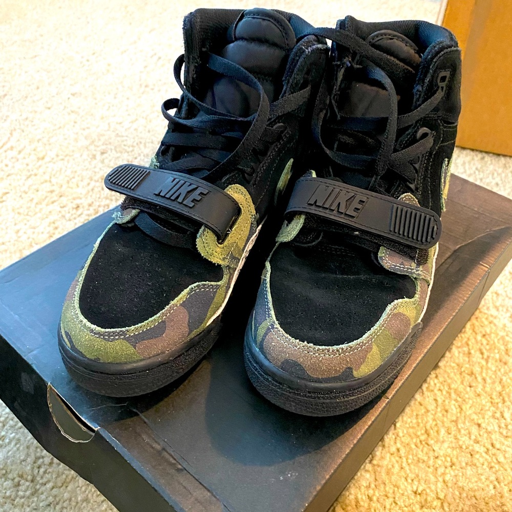 Black and camouflage Jordan’s